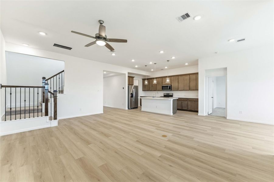 Spacious, unfurnished interior of a new home in Sunterra, Katy (Image 16).