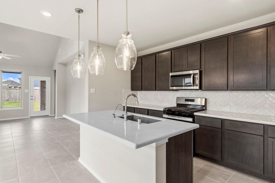 Furnished interior view inside a new home in Bridgeland, Cypress (Image 7).