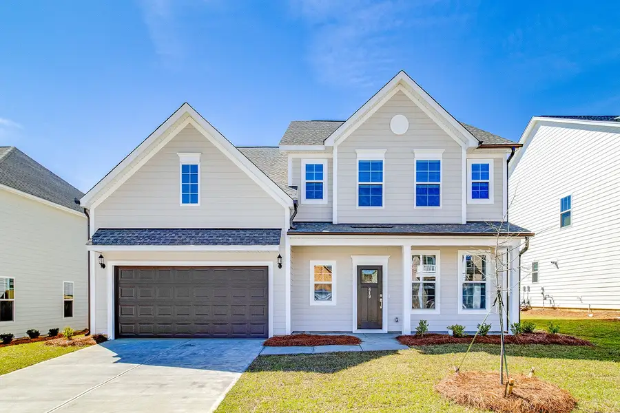 Front exterior of a new home in Pebble Branch, Chapin, SC, highlighting curb appeal (Image 1). Front exterior of a new home in Pebble Branch, Chapin, SC, highlighting curb appeal (Image 1).