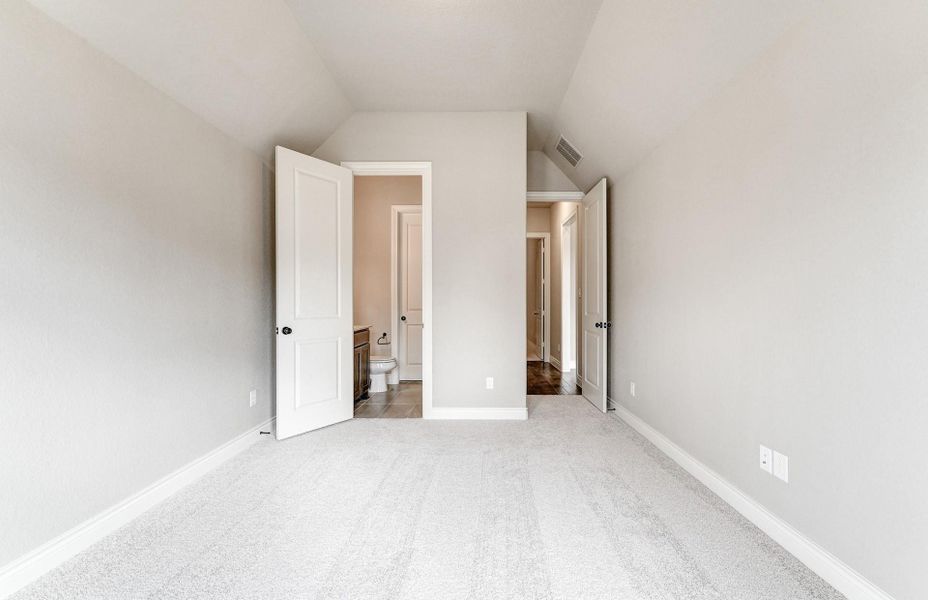 Spacious, unfurnished interior of a new home in The Woodlands Hills 65′, Willis (Image 20).