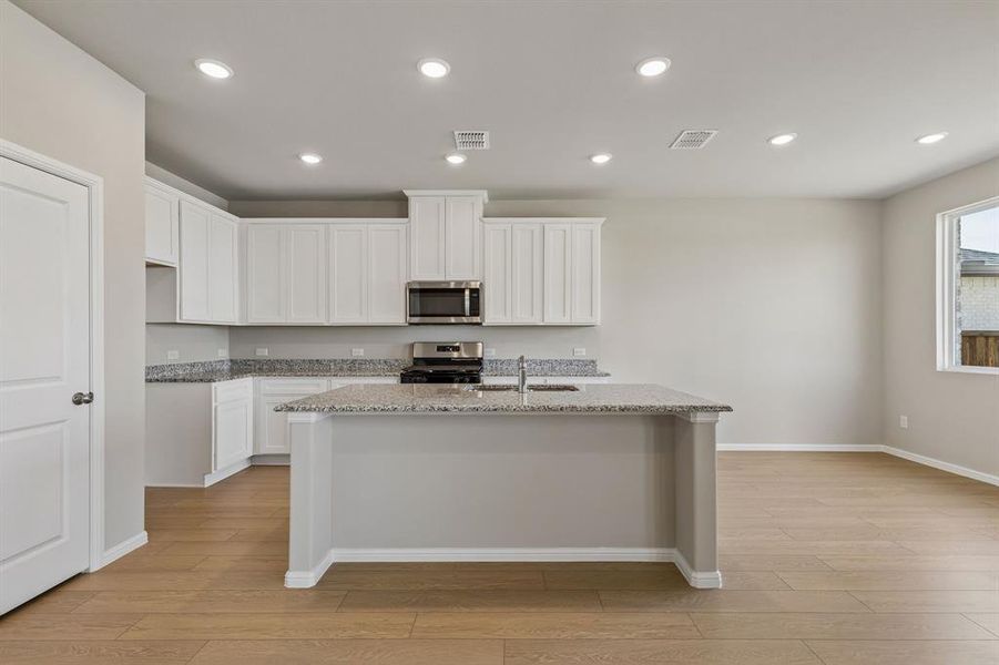 Furnished interior view inside a new home in AnaCapri, Anna (Image 7).