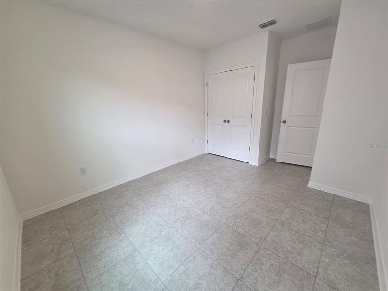 Spacious, unfurnished interior of a new home in Hammock Reserve, Haines City (Image 29). Spacious, unfurnished interior of a new home in Hammock Reserve, Haines City (Image 29).