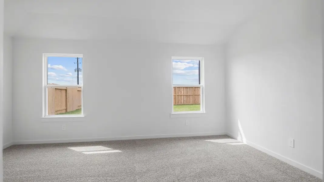 Spacious, unfurnished interior of a new home in Tamarron, Fulshear (Image 27).