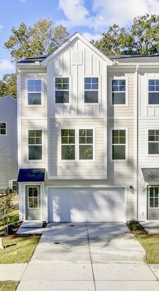 Exterior details and patio area of a home in Indigo Grove Townhomes, Johns Island (Image 2).