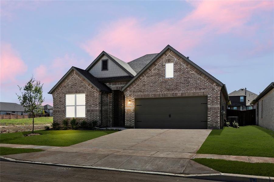 Front exterior of a new home in Creekside, Royse City, TX, highlighting curb appeal (Image 1).