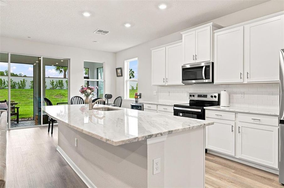 Furnished interior view inside a new home in Star Farms at Lakewood Ranch, Bradenton (Image 11).