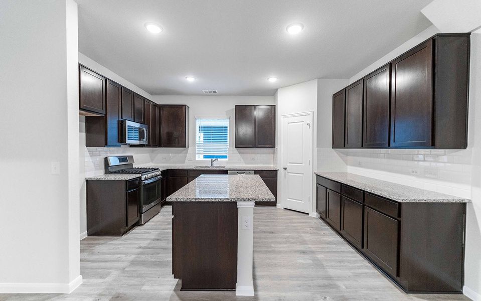 Furnished interior view inside a new home in Brooklands, Hutto (Image 4).