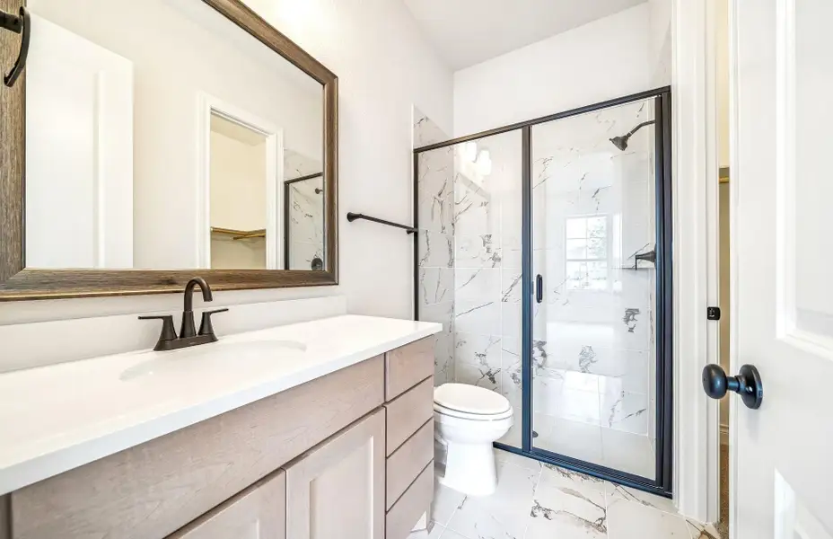 Furnished interior view inside a new home in Bridgeland 60′, Cypress (Image 9).