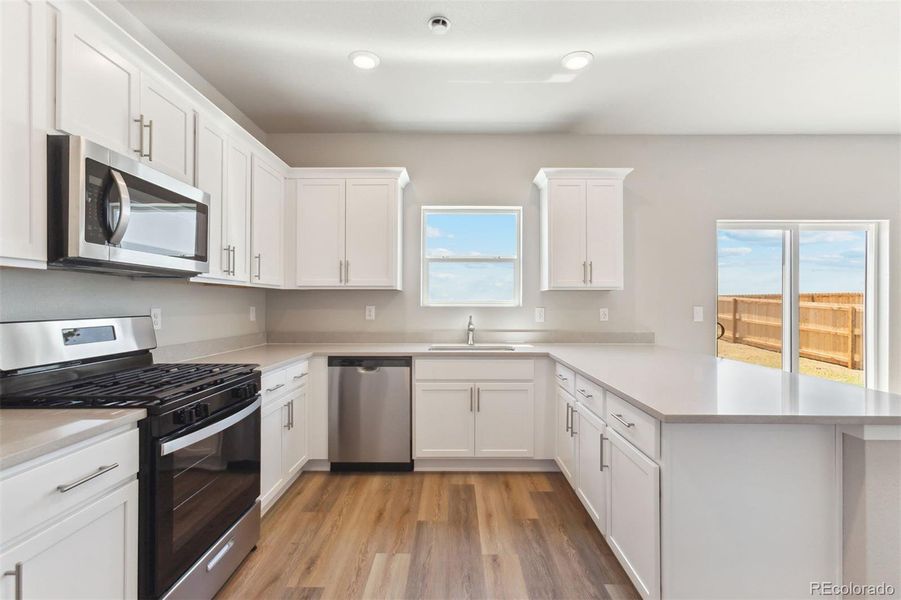 Furnished interior view inside a new home in Bennett Ranch, Bennett (Image 4).