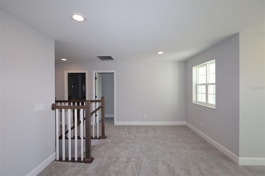 Spacious, unfurnished interior of a new home in Eden at Crossprairie, St. Cloud (Image 34).