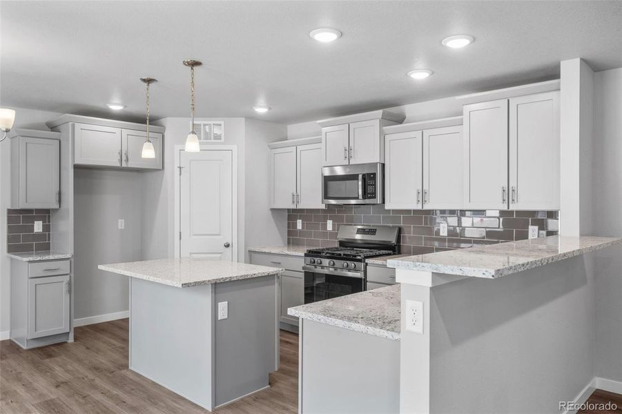 Furnished interior view inside a new home in Sky Ranch – Uptown Collection, Watkins (Image 4).