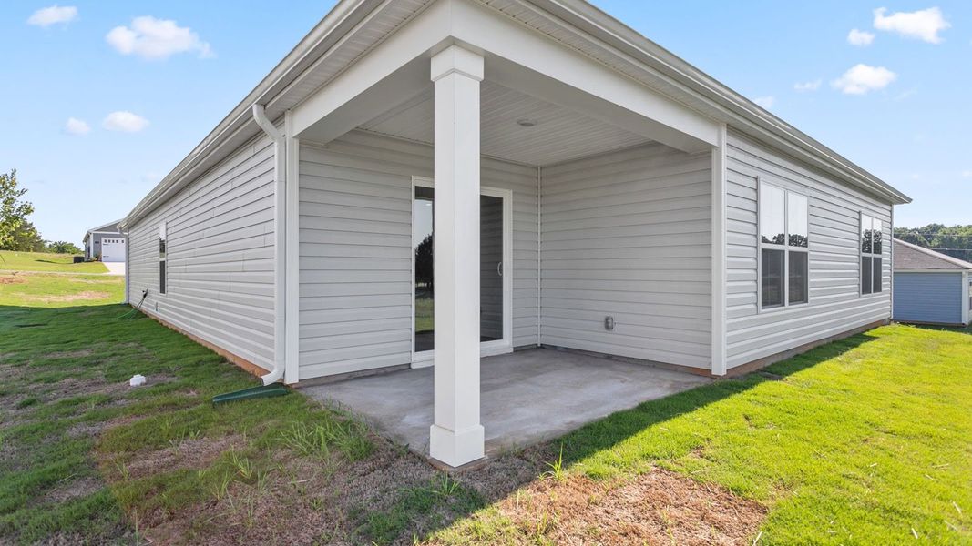 Exterior details and patio area of a home in Madeline Farm, New Bern (Image 3).