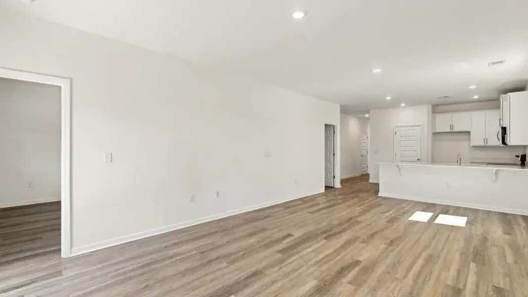 Spacious, unfurnished interior of a new home in The Lakes at North Glynn, Brunswick (Image 13).