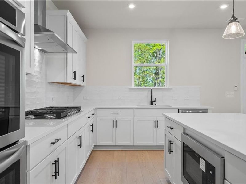Furnished interior view inside a new home in Melody Lakeside Estates, Buford (Image 4).