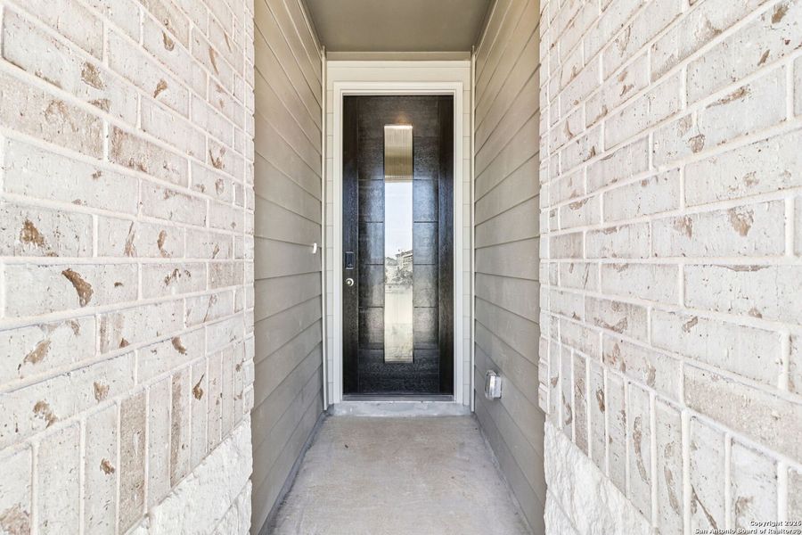 Exterior details and patio area of a home in Lark Canyon, New Braunfels (Image 3).