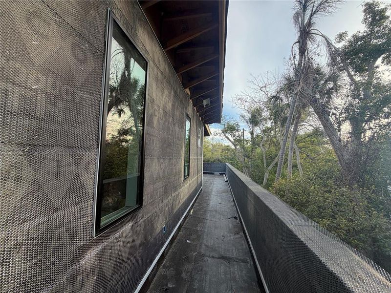 Exterior details and patio area of a home in , Sarasota (Image 7).