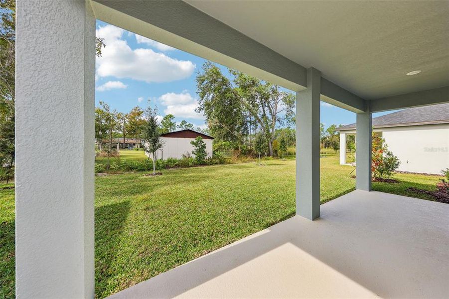 Exterior details and patio area of a home in Ridgehaven - Signature Series, Ormond Beach (Image 3).