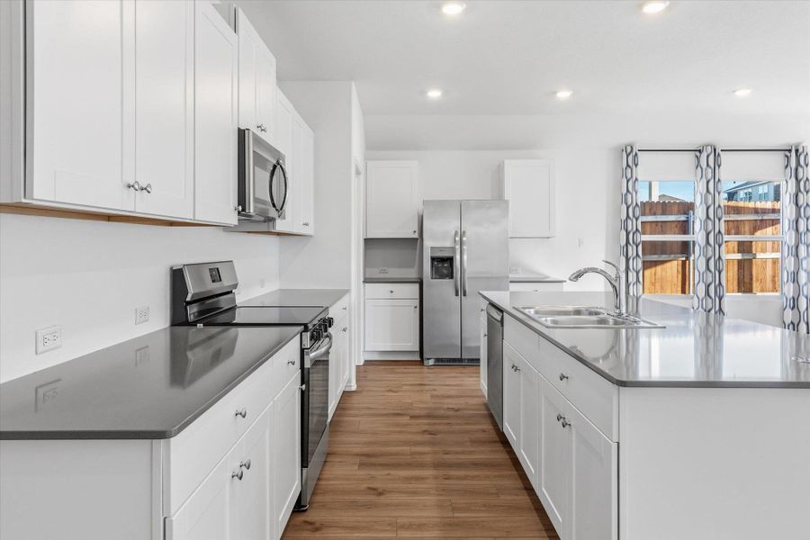 Furnished interior view inside a new home in Thunder Rock: Watermill Collection, Marble Falls (Image 5).