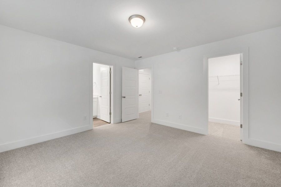 Spacious, unfurnished interior of a new home in Ashmore Townes, Garner (Image 18).