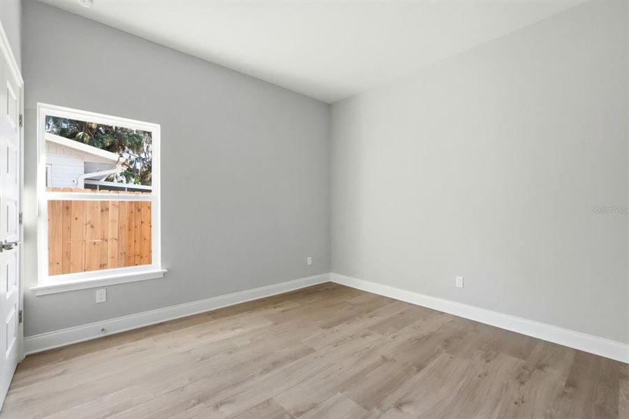 Spacious, unfurnished interior of a new home in , New Smyrna Beach (Image 48).