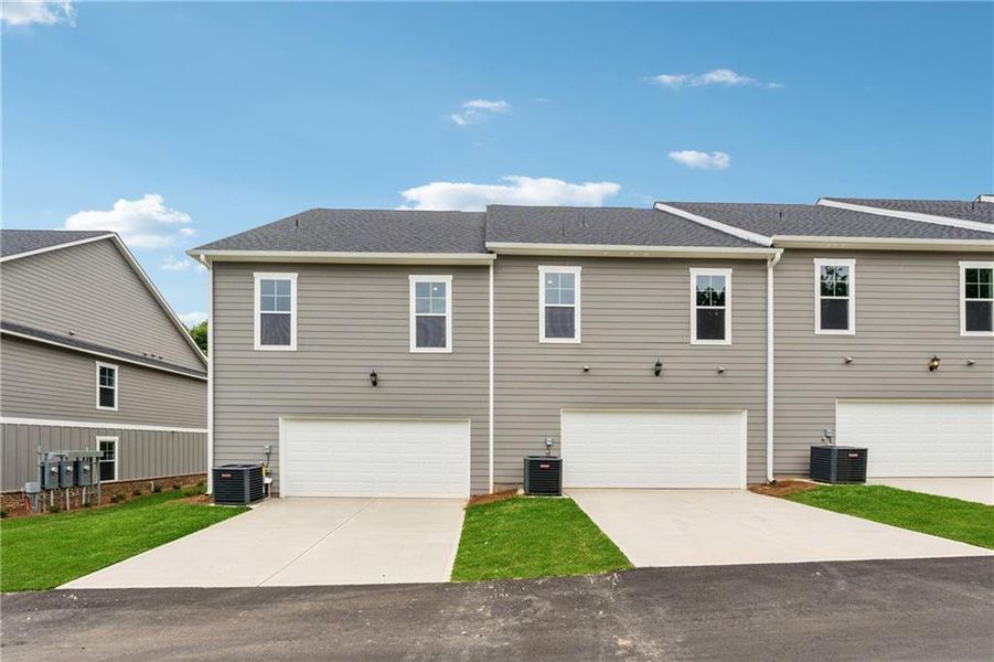 Front exterior of a new home in The Park at Gainesville Township, Gainesville, GA, highlighting curb appeal (Image 20).
