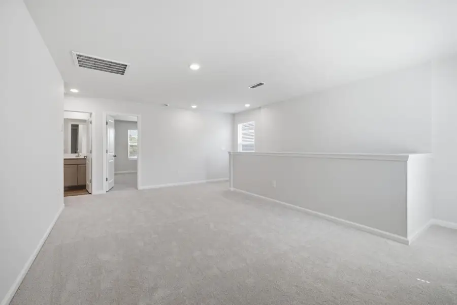 Spacious, unfurnished interior of a new home in Carpenter Falls, Durham (Image 23).