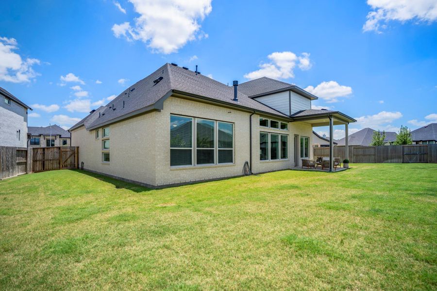 Beautiful inside and out, this home also includes thoughtful behind-the-scenes features designed for everyday comfort and efficiency, including a water softener, owned security system, attic vents, ceiling fans, reflective roofing, high-efficiency HVAC and insulated Low-E windows.