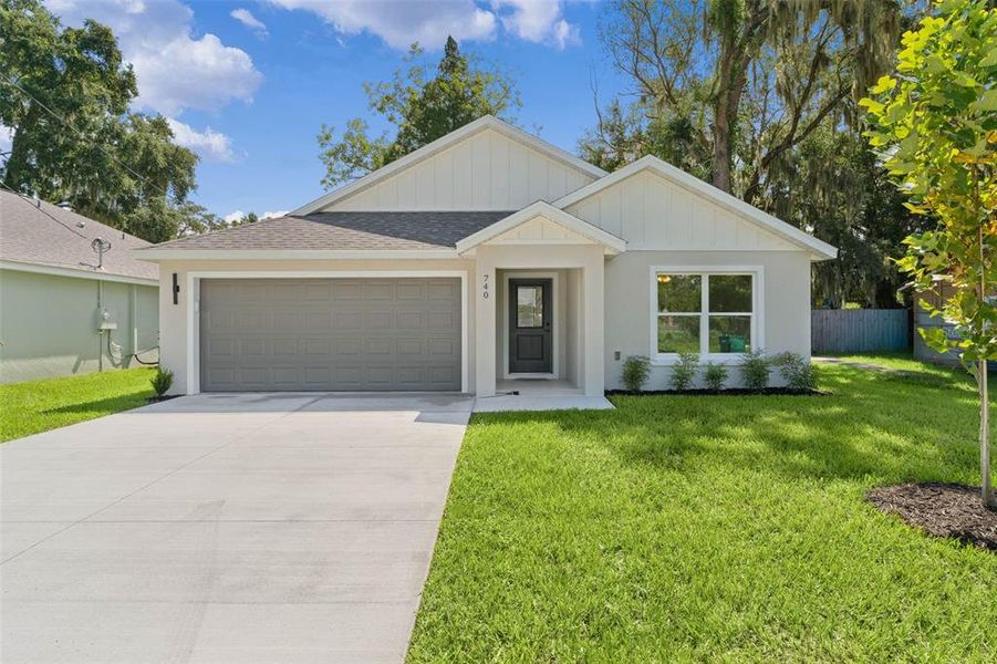 Front exterior of a new home in , Wildwood, FL, highlighting curb appeal (Image 23).