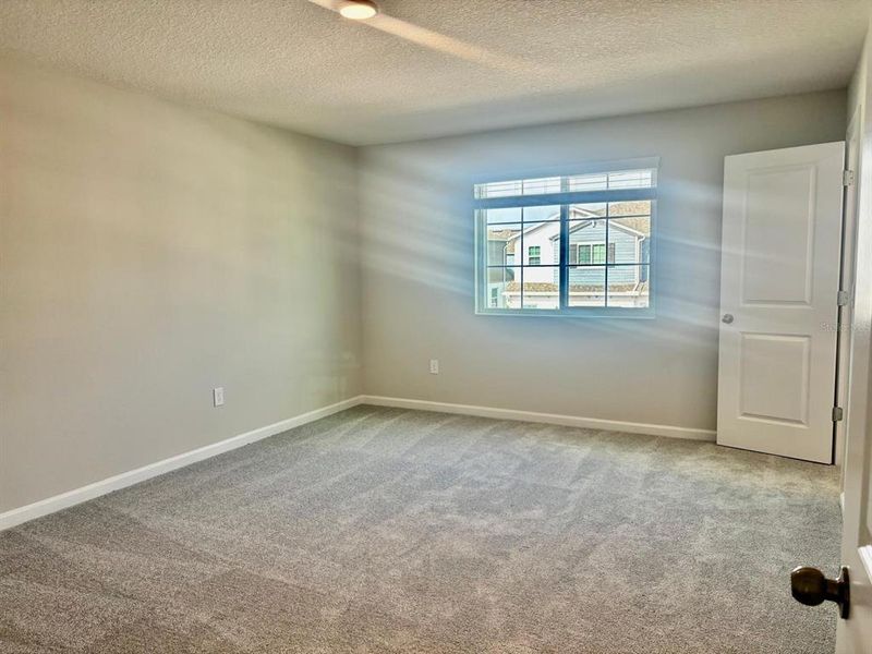 Spacious, unfurnished interior of a new home in , Orlando (Image 9).