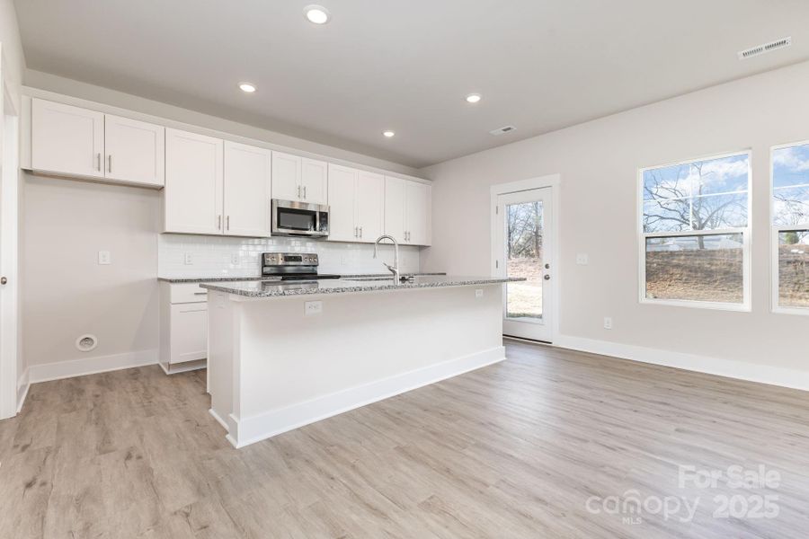 Furnished interior view inside a new home in , Mooresville (Image 6).