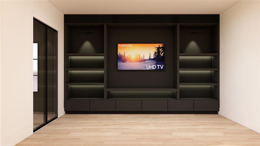 Cinema featuring wood finished floors and built in shelves