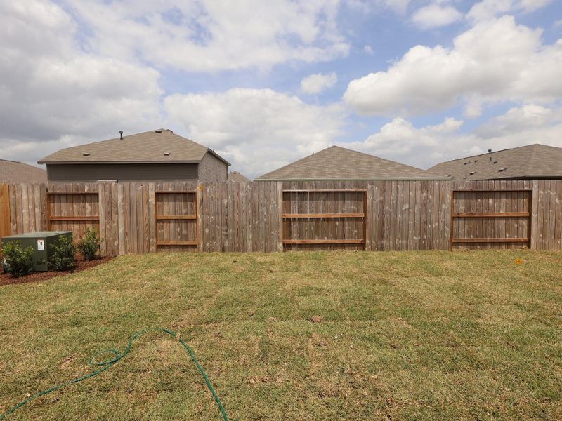 Exterior details and patio area of a home in Miller's Pond, Rosenberg (Image 4).