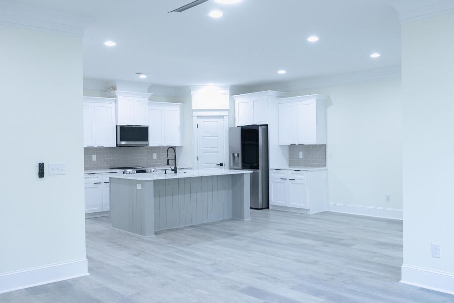 Furnished interior view inside a new home in , North Charleston (Image 10).