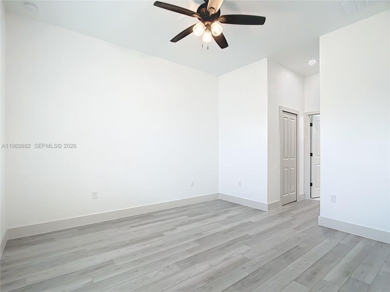 Spacious, unfurnished interior of a new home in , Port Charlotte (Image 32).