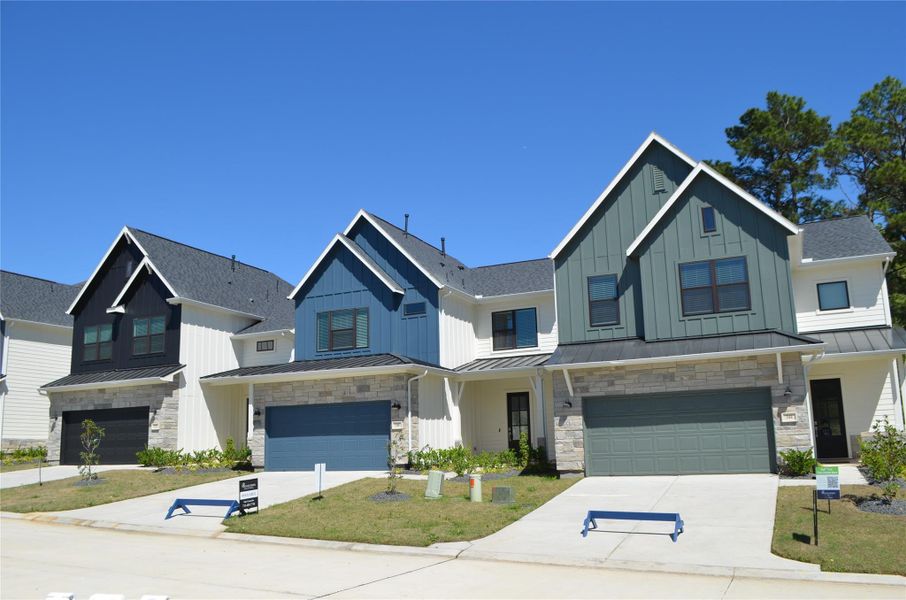 Front exterior of a new home in Summer Place 35', Montgomery, TX, highlighting curb appeal (Image 2). Front exterior of a new home in Summer Place 35', Montgomery, TX, highlighting curb appeal (Image 2).