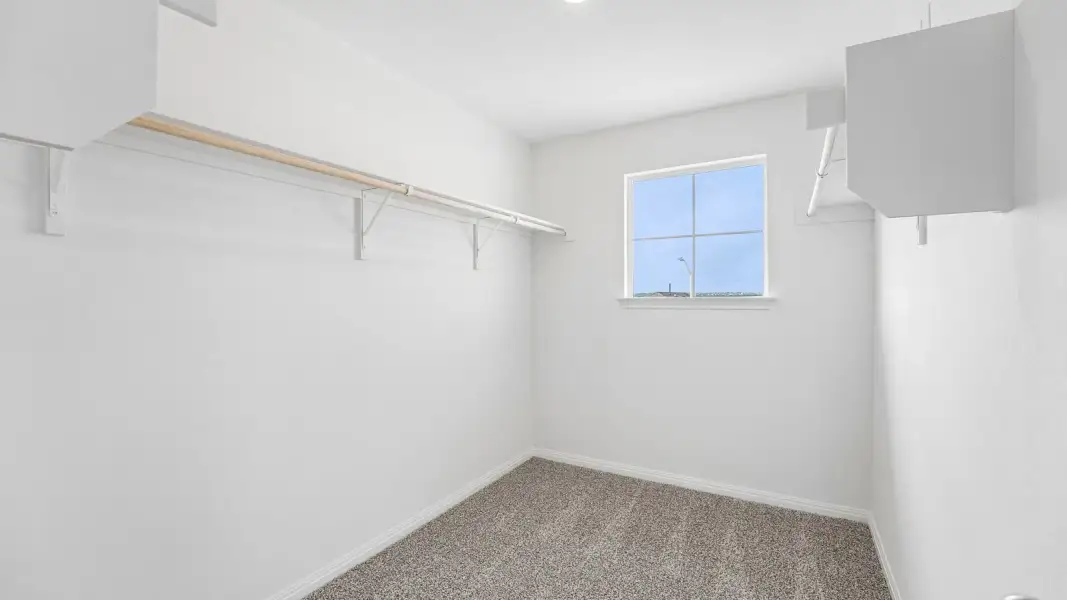 Spacious, unfurnished interior of a new home in Bar W Ranch, Leander (Image 34).
