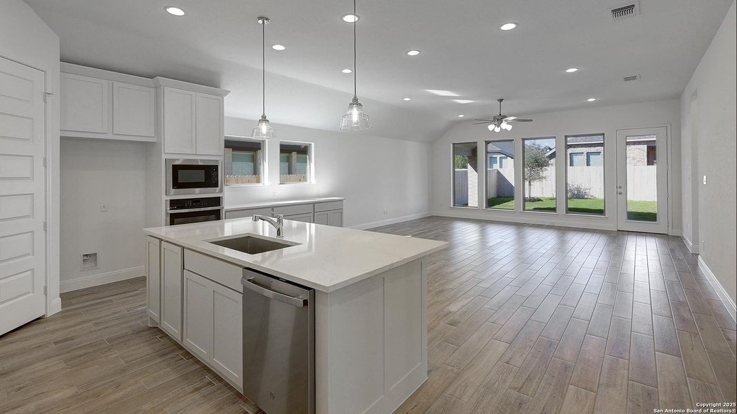 Furnished interior view inside a new home in Kallison Ranch 50', San Antonio (Image 8).