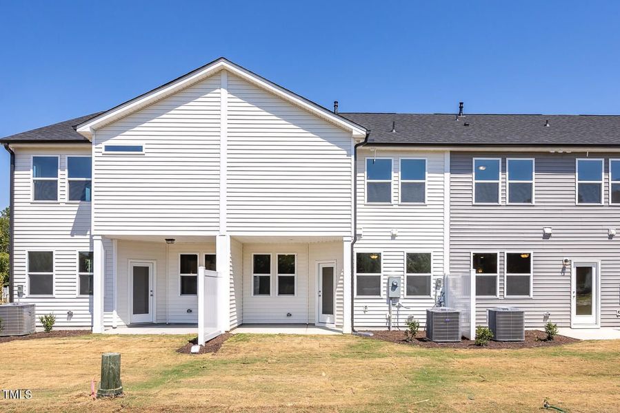 Front exterior of a new home in Springvale, Fuquay Varina, NC, highlighting curb appeal (Image 2). Front exterior of a new home in Springvale, Fuquay Varina, NC, highlighting curb appeal (Image 2).
