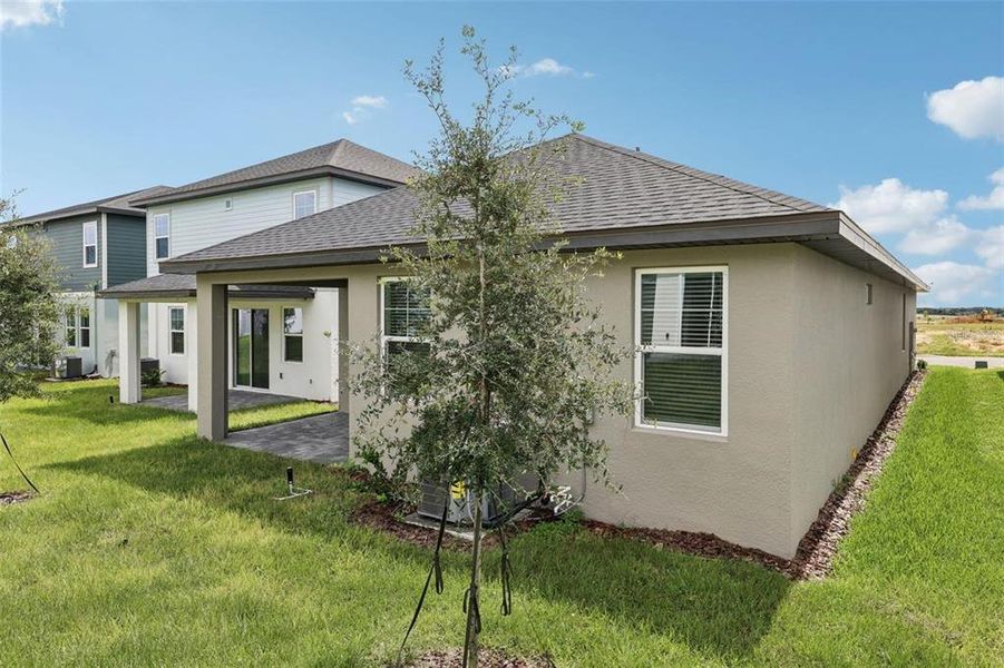 Exterior details and patio area of a home in Cyrene at Minneola, Minneola (Image 22).