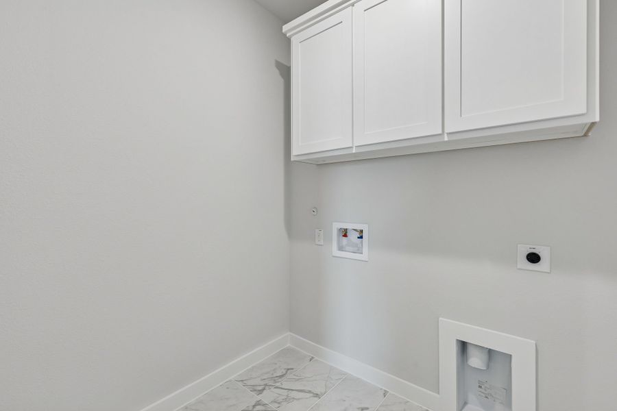 Utility Room in the Stanley II home plan by Trophy Signature Homes – REPRESENTATIVE PHOTO Utility Room in the Stanley II home plan by Trophy Signature Homes – REPRESENTATIVE PHOTO