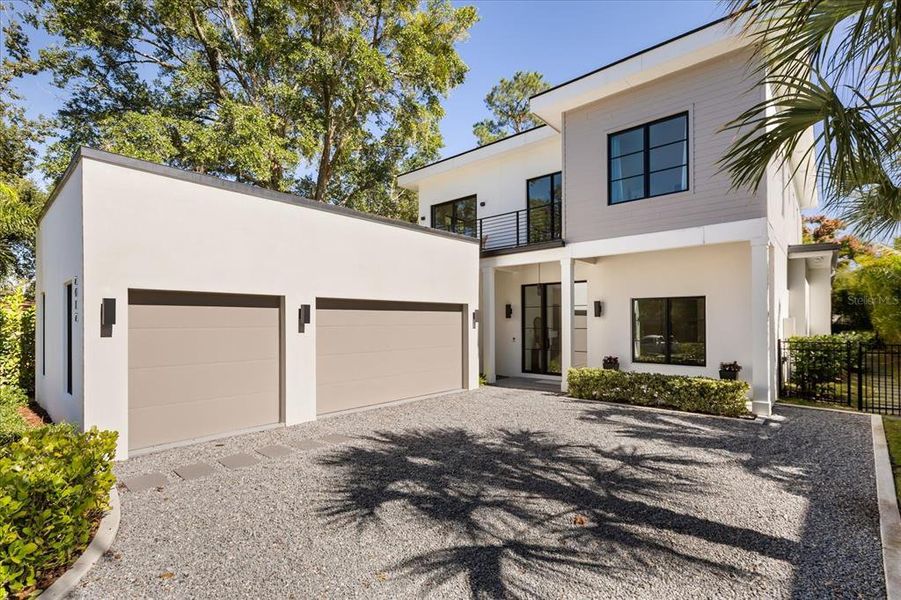 Front exterior of a new home in , Winter Park, FL, highlighting curb appeal (Image 27). Front exterior of a new home in , Winter Park, FL, highlighting curb appeal (Image 27).