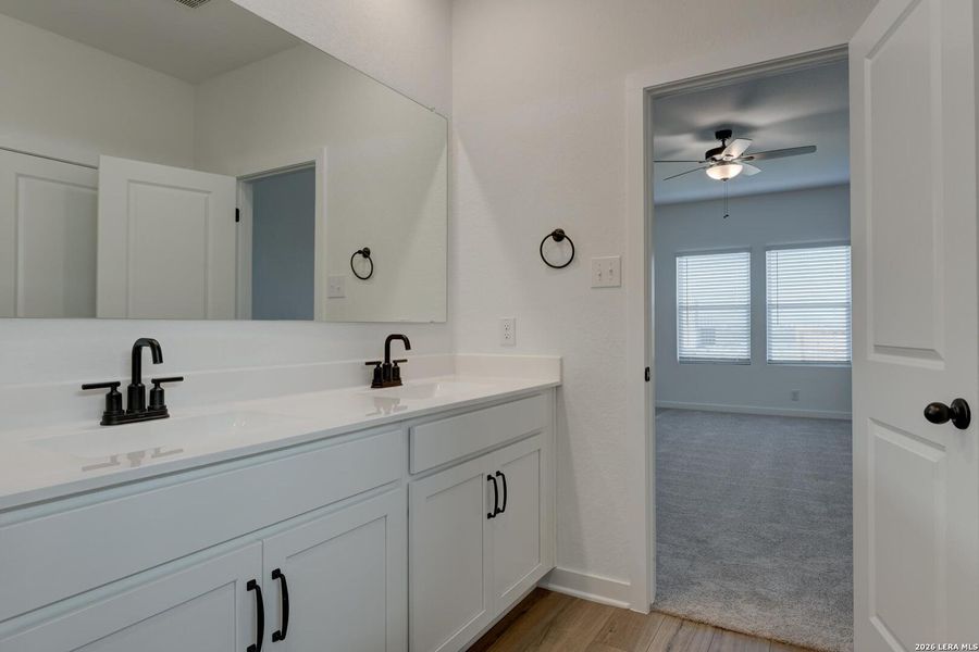 Furnished interior view inside a new home in Hennersby Hollow, San Antonio (Image 8).