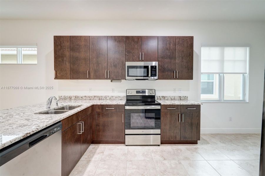 Furnished interior view inside a new home in , Port St. Lucie (Image 3).
