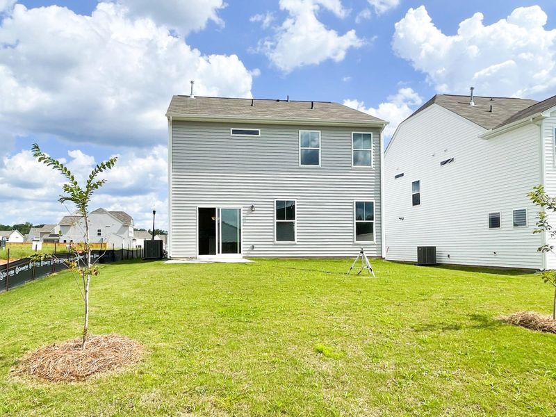 Front exterior of a new home in Harrington, Greenville, SC, highlighting curb appeal (Image 2).