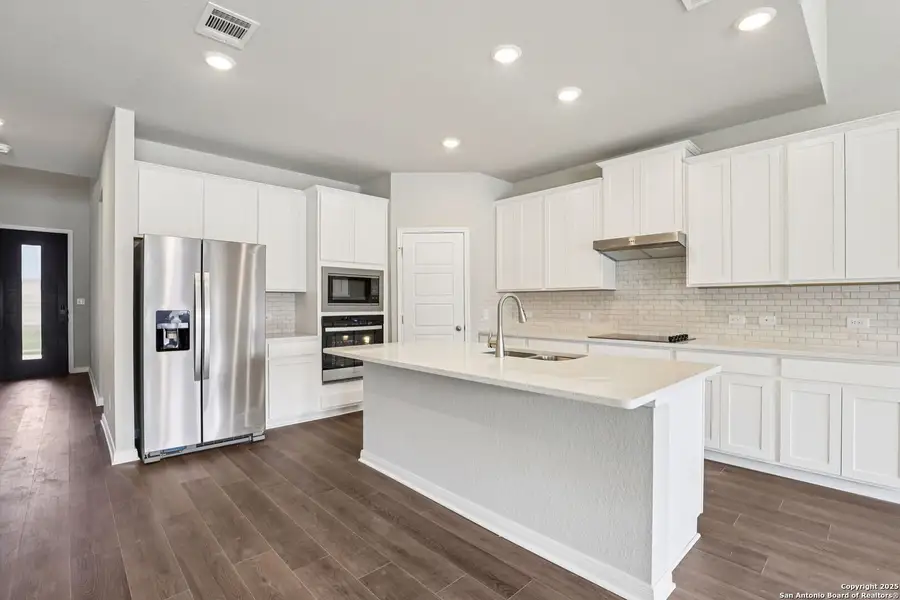 Furnished interior view inside a new home in Legendary Trails - Classic Series, Cibolo (Image 19). Furnished interior view inside a new home in Legendary Trails - Classic Series, Cibolo (Image 19).