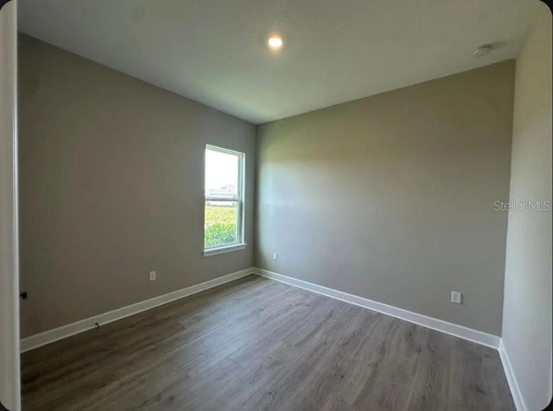 Spacious, unfurnished interior of a new home in Center Lake Ranch Community Group Page, St. Cloud (Image 8).