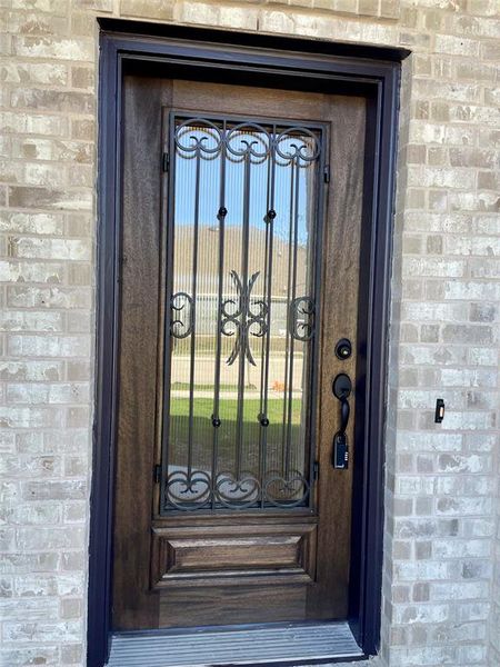 Exterior details and patio area of a home in Mercer Meadows, Royse City (Image 2). Exterior details and patio area of a home in Mercer Meadows, Royse City (Image 2).