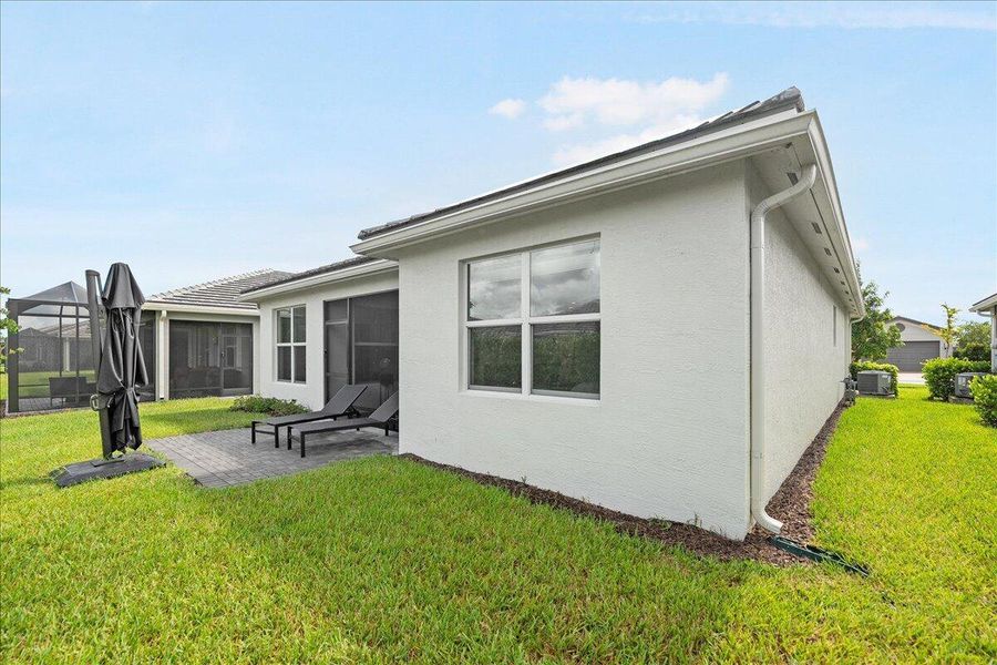 Front exterior of a new home in , Port St. Lucie, FL, highlighting curb appeal (Image 18).