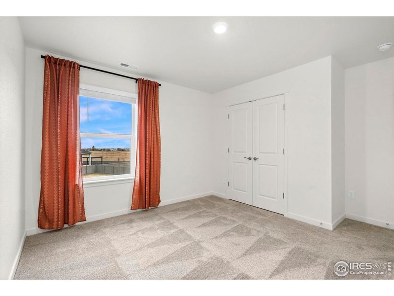 Spacious, unfurnished interior of a new home in Vantage, Berthoud (Image 24).