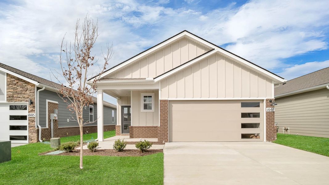 Front exterior of a new home in Nexus South, Gallatin, TN, highlighting curb appeal (Image 24). Front exterior of a new home in Nexus South, Gallatin, TN, highlighting curb appeal (Image 24).